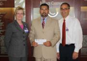 Pictured left to right are Donna Stephens, RN, administrative director of performance improvement, Steven Stefanelli of Horizon, and Dr. Peter Jungblut, vice president of medical affairs.